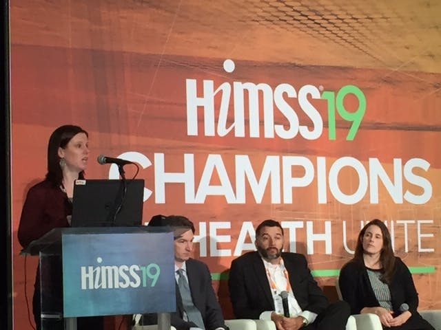 Alexandra Mugge (speaking) and other CMS and ONC officials discuss the just-released proposed rules, at a HIMSS19 session