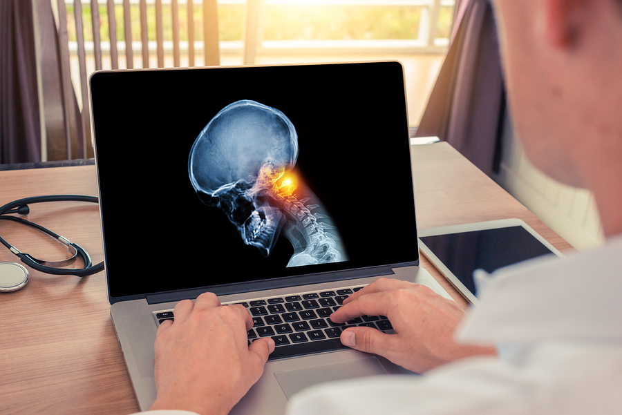 Bigstock Doctor Watching A Laptop With 303056431 5dfede2af2618