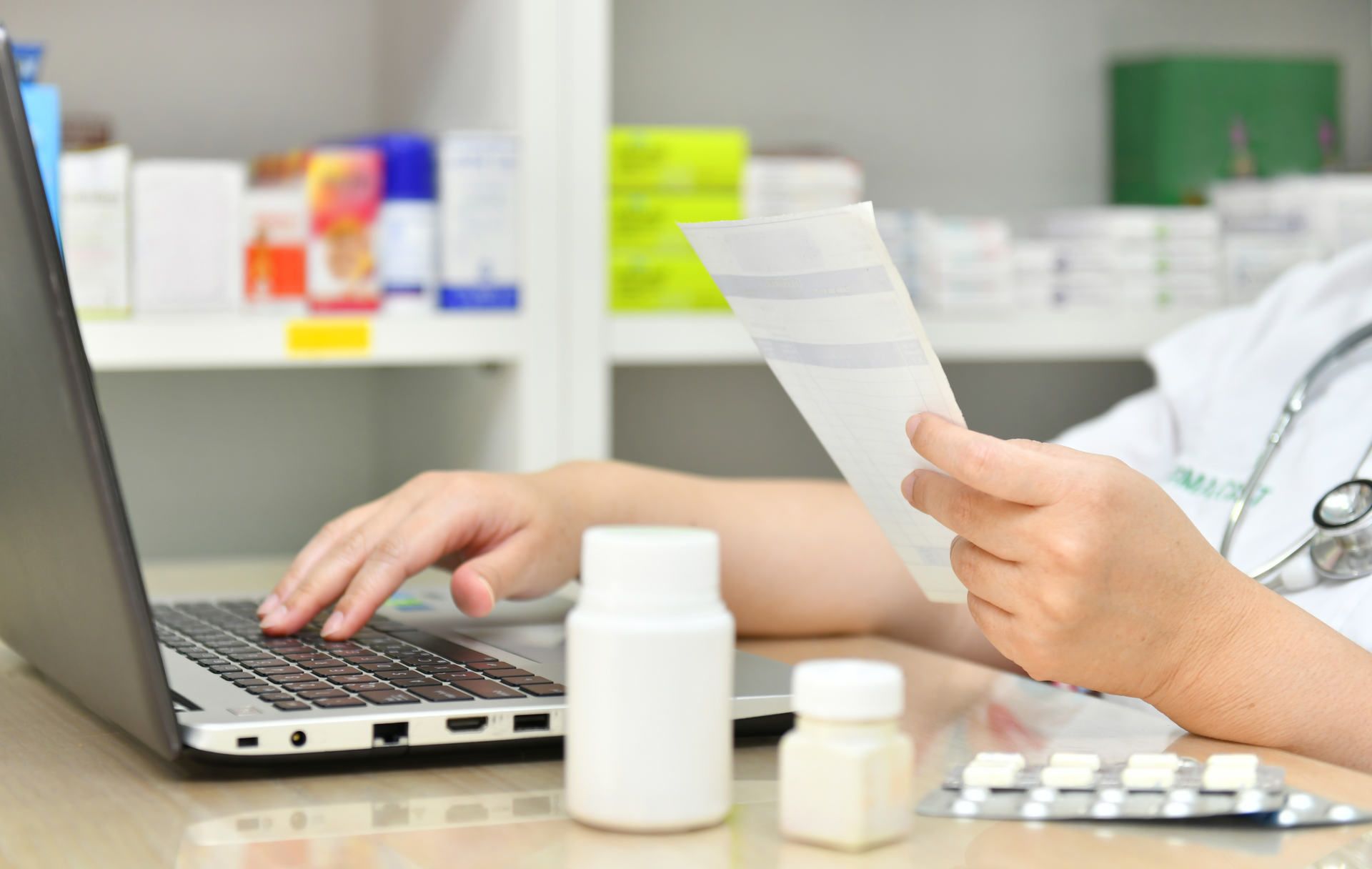 Bigstock Pharmacist Using The Computer 382105241 5f7735bc552d2