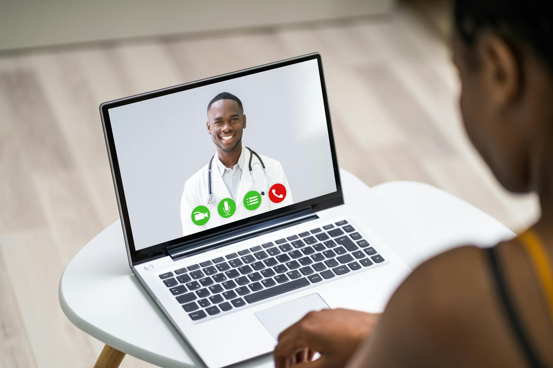 Patient using telehealth to talk with doctor