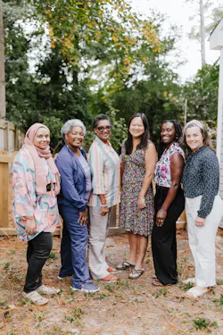 UNC Health’s Jennifer Tang, M.D., (third from right) and Rachel Peragallo Urrutia, M.D., (right) meet with some of the doulas from Momma's Village-Fayetteville in North Carolina.